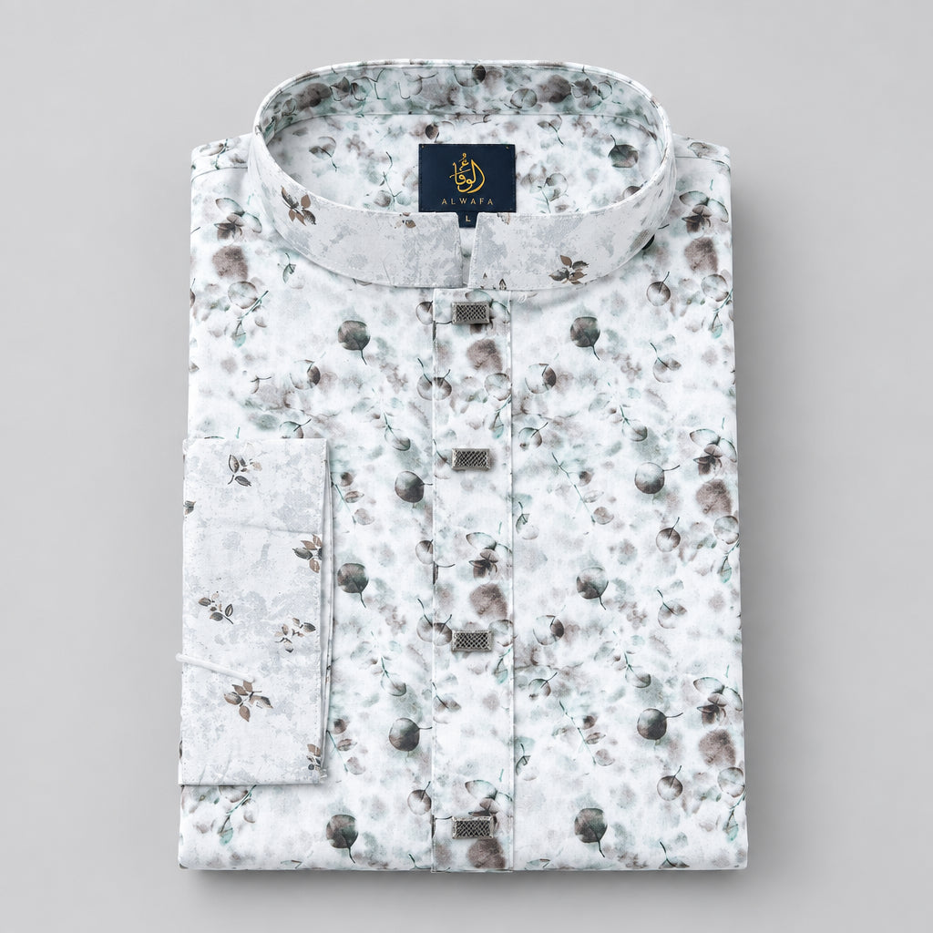 A folded long-sleeve button-up shirt with a light blue-gray base and a brown floral print, displayed on a beige wooden chair with a black brand tag attached.