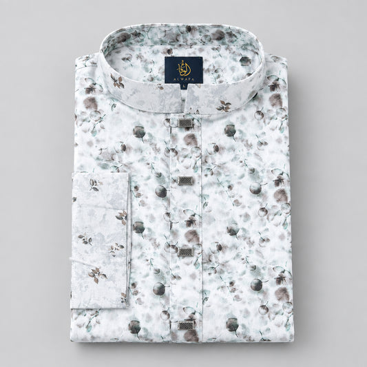 A folded long-sleeve button-up shirt with a light blue-gray base and a brown floral print, displayed on a beige wooden chair with a black brand tag attached.
